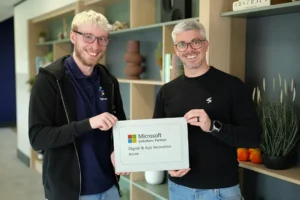 Platform engineers holding Synextra's Digital & App Innovation award